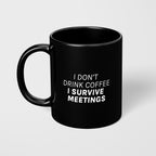Tazza "I don't drink coffee, I survive meetings"